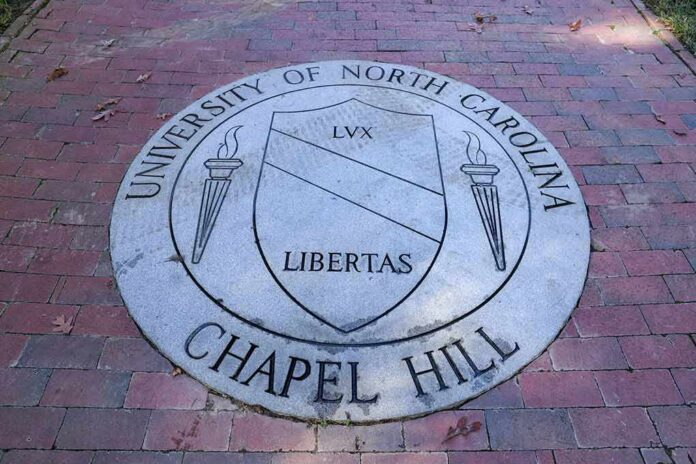 Stone university seal inset in a brick walkway