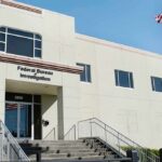 Authorities Uncover A Cross-Border Criminal Operation FBI office building with entrance steps and American flag