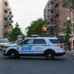 One Wedding Brought Midtown To A Standstill NYPD police SUV blocking a city street at a taped-off scene