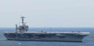 Aircraft carrier sailing at sea
