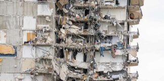 partially collapsed apartment building facade