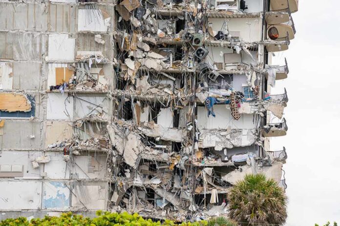 shutterstock_1996561049 partially collapsed apartment building facade