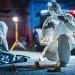 The Questions Following a Trooper’s Death forensic investigators at nighttime crime scene