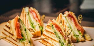 Club sandwich quarters on a wooden board