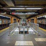 Subway platform with stairwell and tracks on both sides