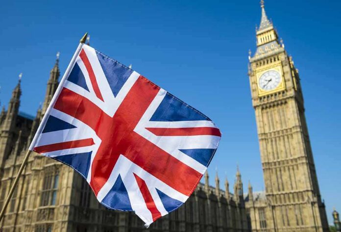 Union Jack flag with Elizabeth Tower in the background