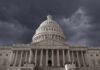 United States Capitol building under stormy skies