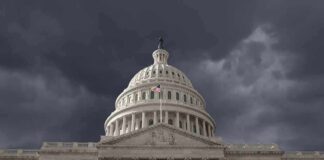 United States Capitol building under stormy skies