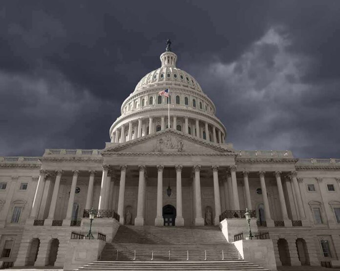 shutterstock_130943276 United States Capitol building under stormy skies