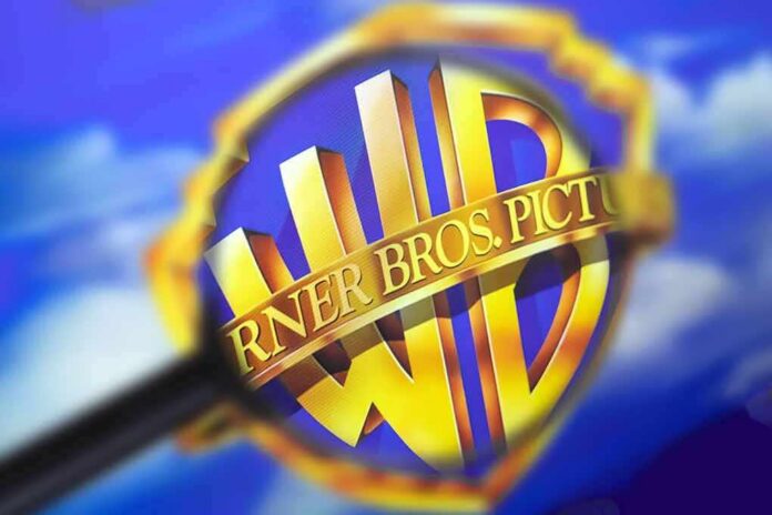 shutterstock_1341385196 Warner Bros. shield logo under a magnifying glass