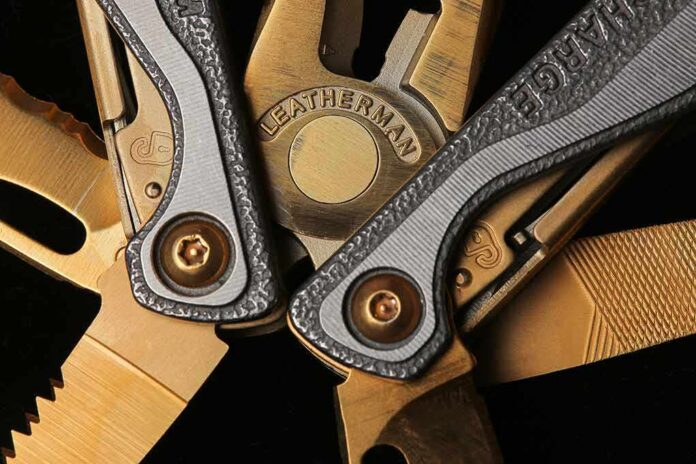 shutterstock_1933272026 Leatherman multi-tool close-up with metal blades and textured handles