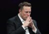 Elon Musk seated with hands steepled in thought